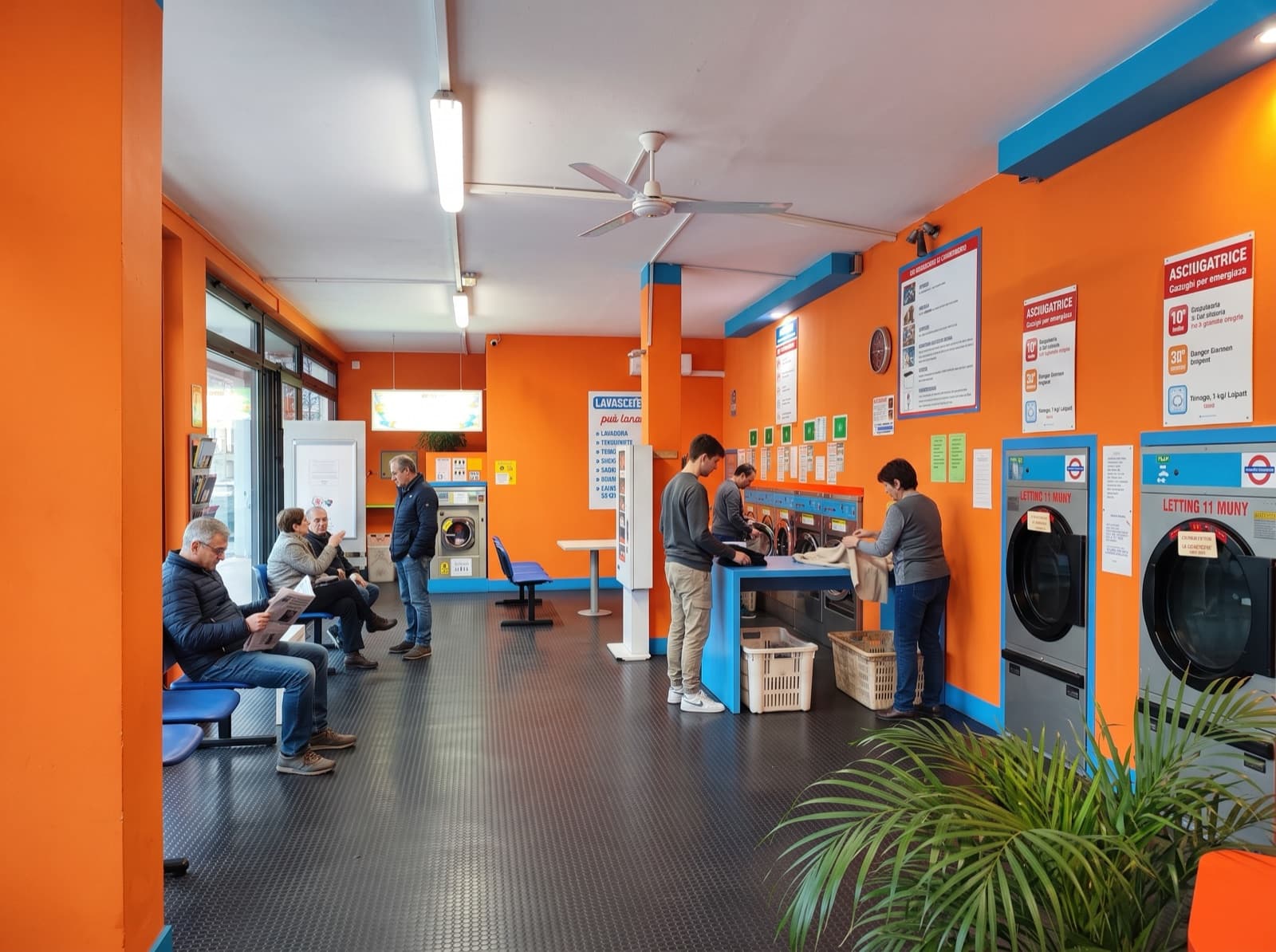 Lavanderia Patuka self-service laundry interior in Montebelluna with washing machines and dryers